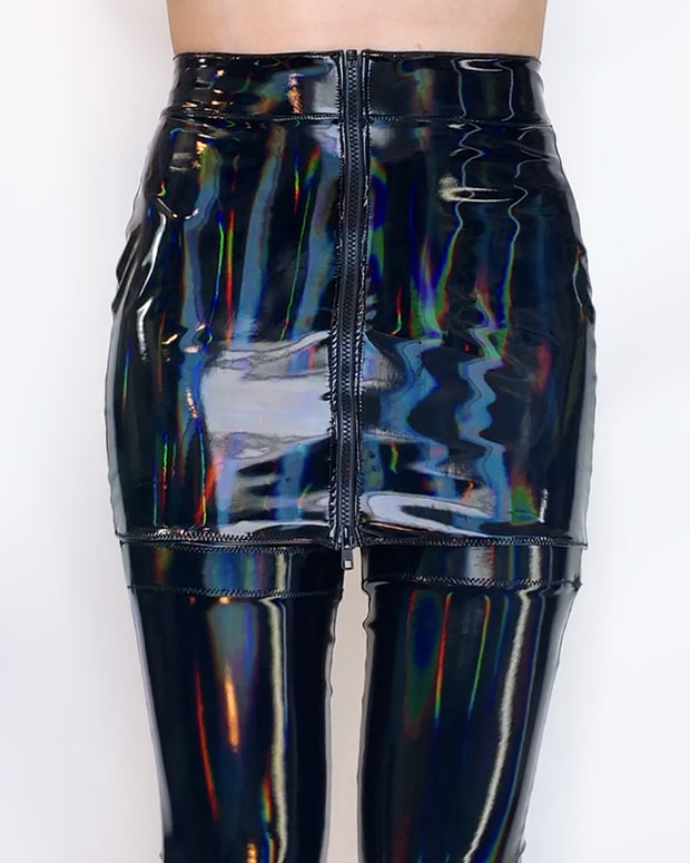 Artifice Clothing - Delaney MicahLynne in a Holographic PVC underbust  Corset ($115) worn with a Holographic PVC zipper skirt ($50), and a  Holographic Spiked Choker ($45), and a Holographic PVC Bra ($75)